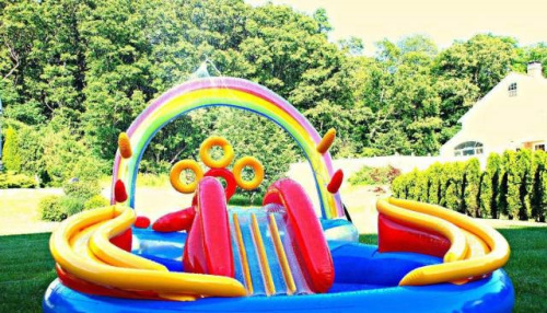 Дитячий надувний ігровий центр Intex 57453 «Веселка» (135*193*297 см, водна гірка, два басейна 175+206 л, кільця, фонтан, ненадувне дно, до 80 кг) фото 4